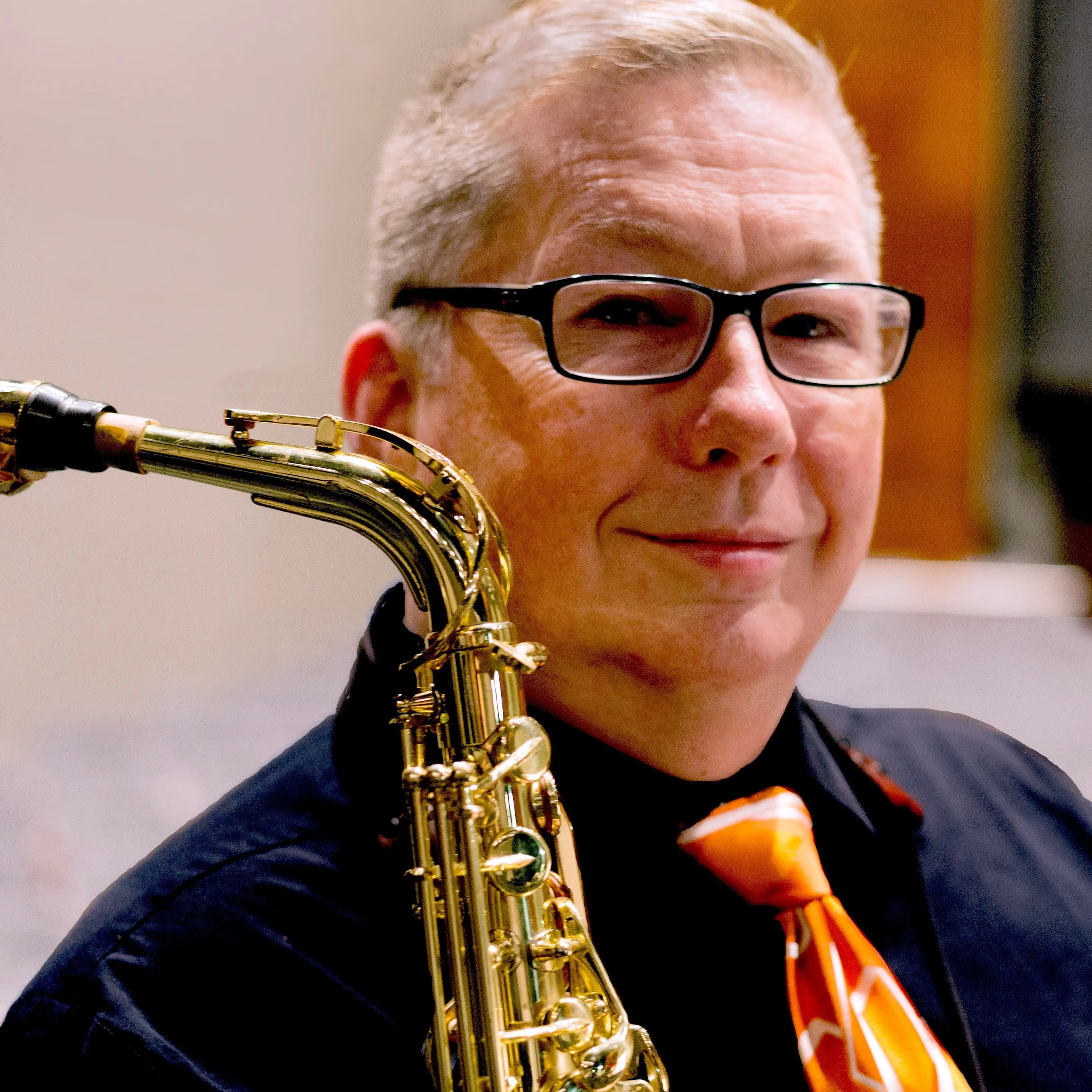 R. Stevens, SAXpress owner, editor, arranger, general flunky